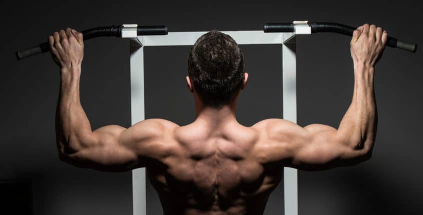 Bodybuilder working on back muscles